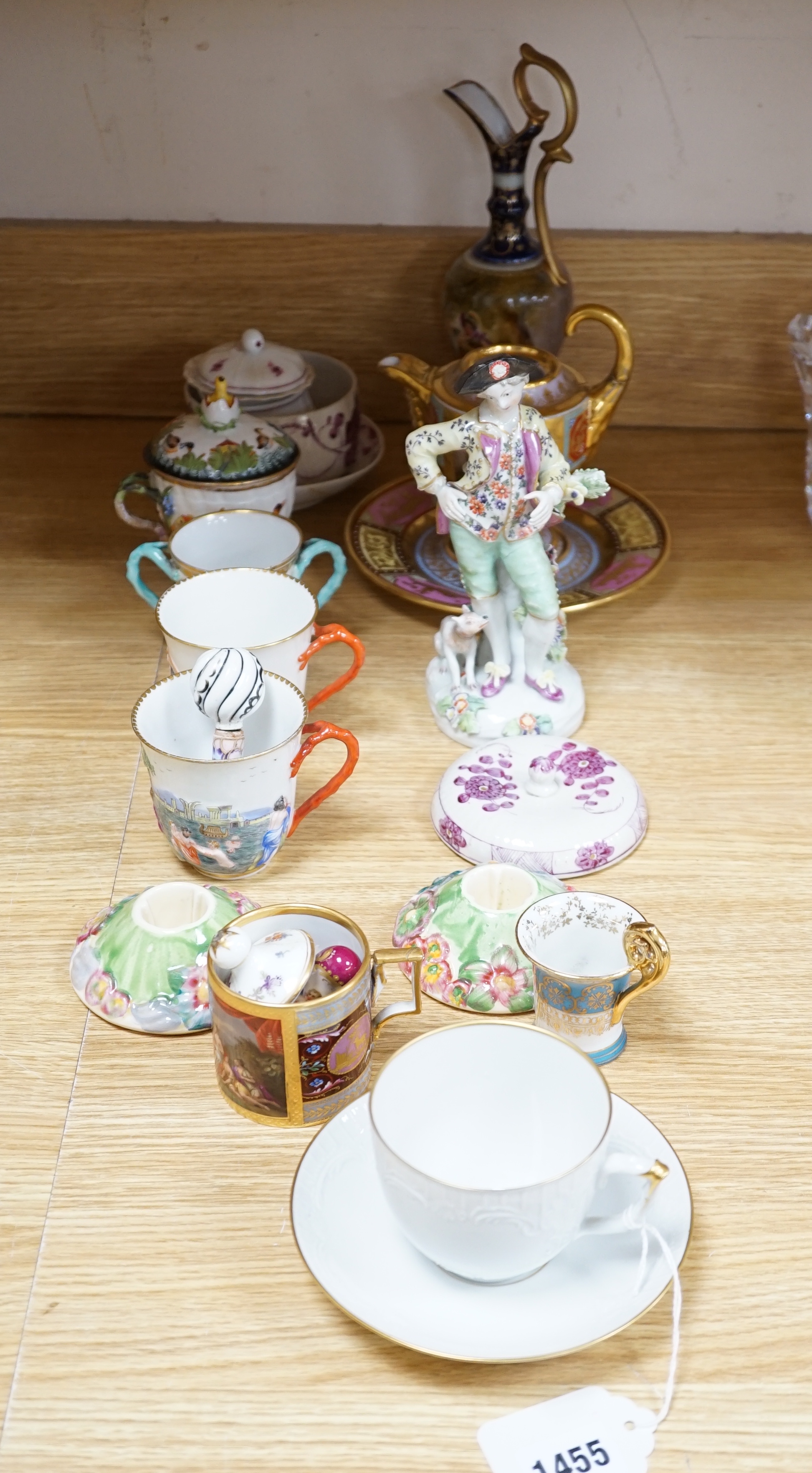 19th century Continental tableware, including Richard Ginori Capodimonte style cups and a porcelain figure group of a gentleman and dog, largest 25cm high